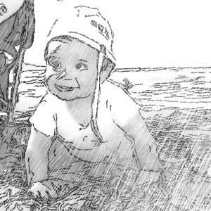 bebé gateando en la playa